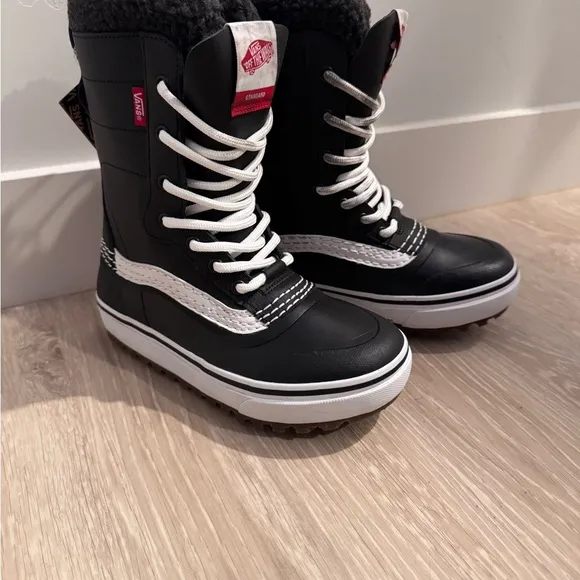 Brand new Vans Black and White High-Top Boots