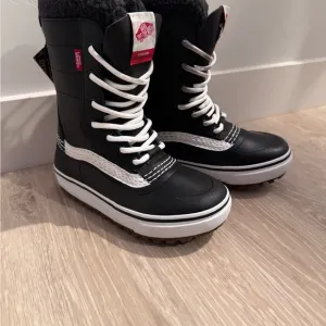 Brand new Vans Black and White High-Top Boots