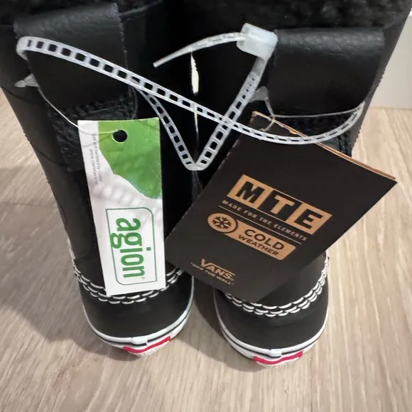 Brand new Vans Black and White High-Top Boots