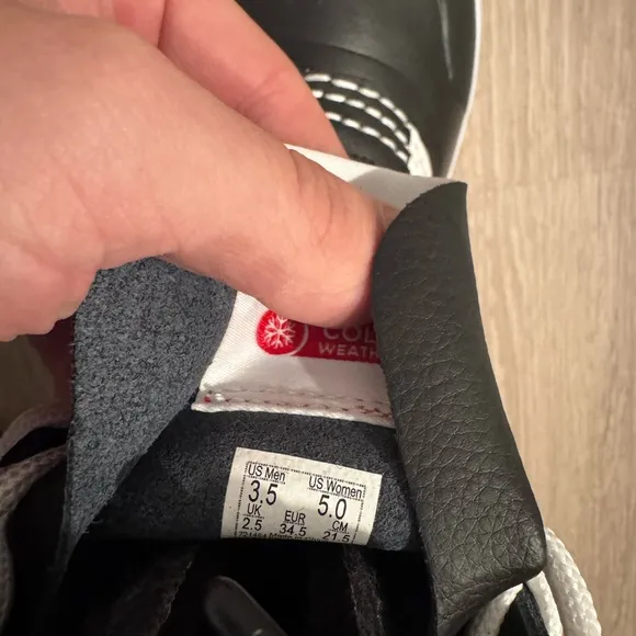 Brand new Vans Black and White High-Top Boots