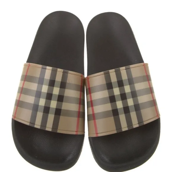 Burberry plaid print rubber slides.