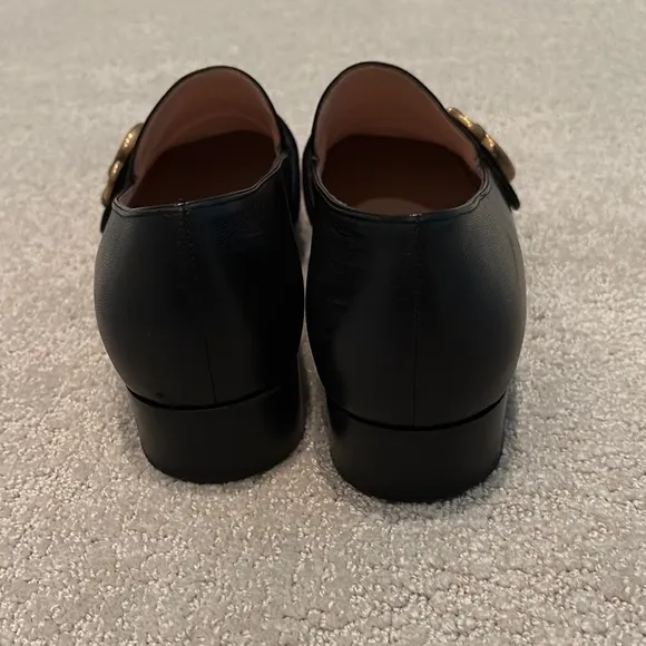 Gucci Black and Gold Loafers with Signature GG Hardware