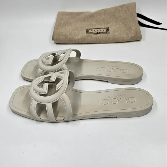 Gucci Palma rubber slides sandals.