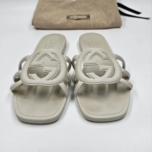Gucci Palma rubber slides sandals.