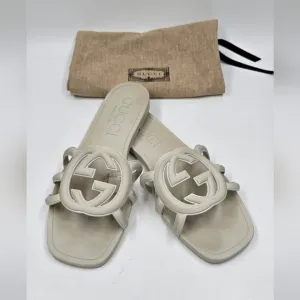 Gucci Palma rubber slides sandals.