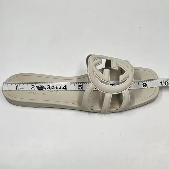 Gucci Palma rubber slides sandals.
