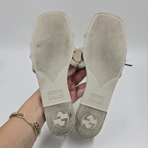 Gucci Palma rubber slides sandals.