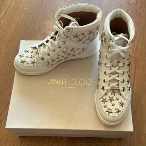 Jimmy Choo White High-Top Leather Sneakers with Star Accents