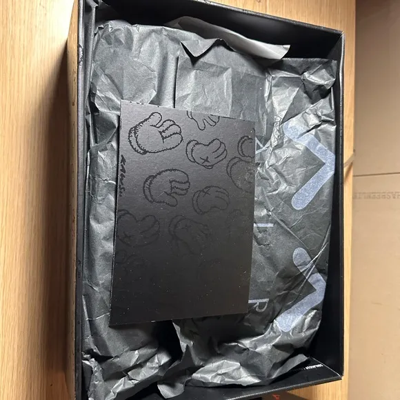 KAWS Gray Sneakers Stylish and Iconic