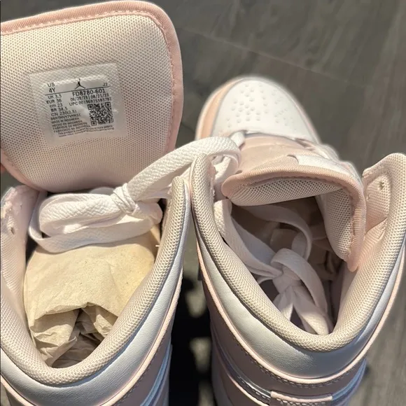 Nike Pink and White Sneakers with Classic Design