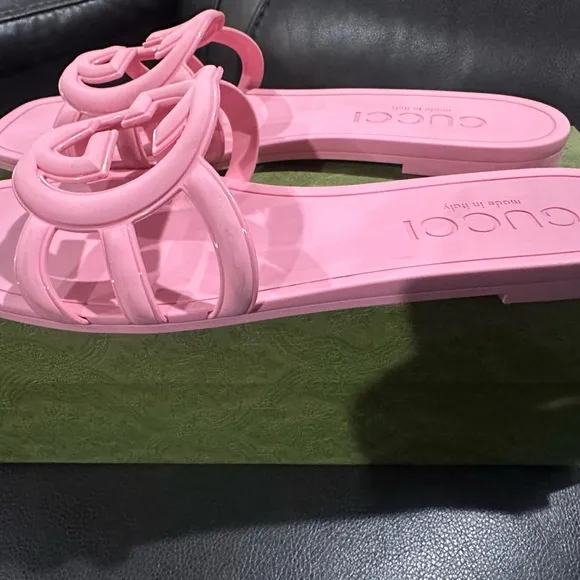 Pink rubber Gucci slides purchased September 2024 slightly used