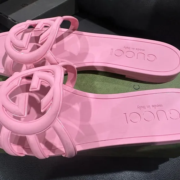 Pink rubber Gucci slides purchased September 2024 slightly used