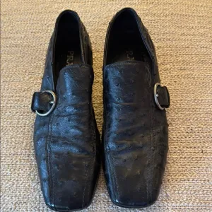 Prada Men's Black Leather Loafers size 9.5european size on the shoe’s ostrich