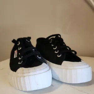 Steve Madden Black and White Platform Sneakers