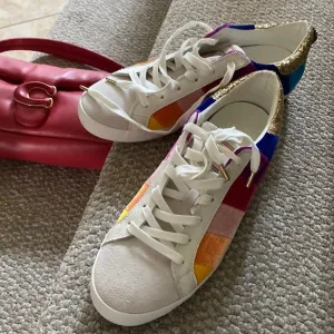 Summer statement in a bright snazzy sneakers by Kurt Geiger!