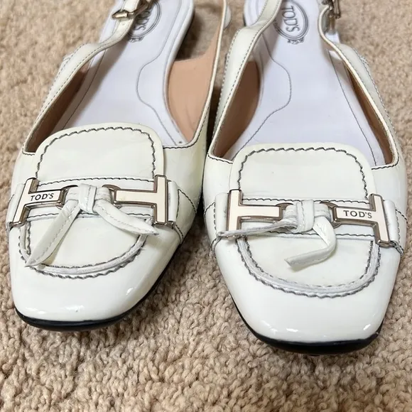 Tod's SZ 10, made in Italy smooth white flats with back ankle strap.
