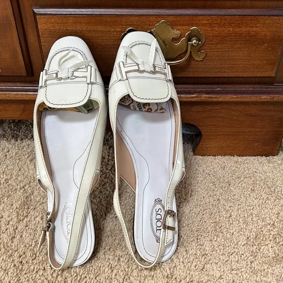 Tod's SZ 10, made in Italy smooth white flats with back ankle strap.