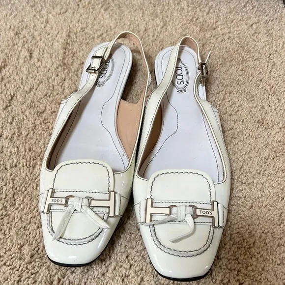 Tod's SZ 10, made in Italy smooth white flats with back ankle strap.