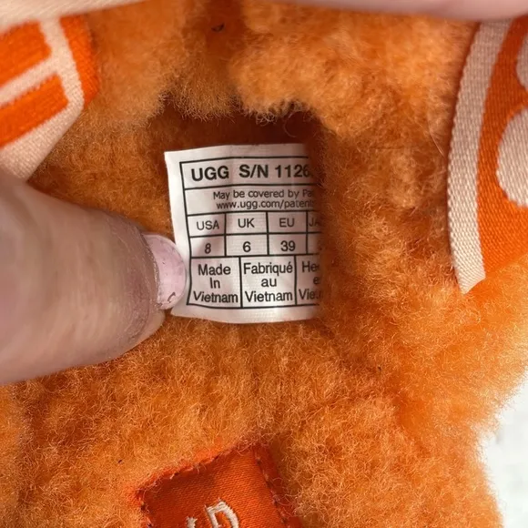 UGG Disco Knott Orange sheepskin platform slides