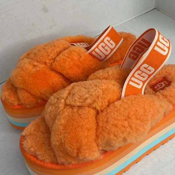 UGG Disco Knott Orange sheepskin platform slides