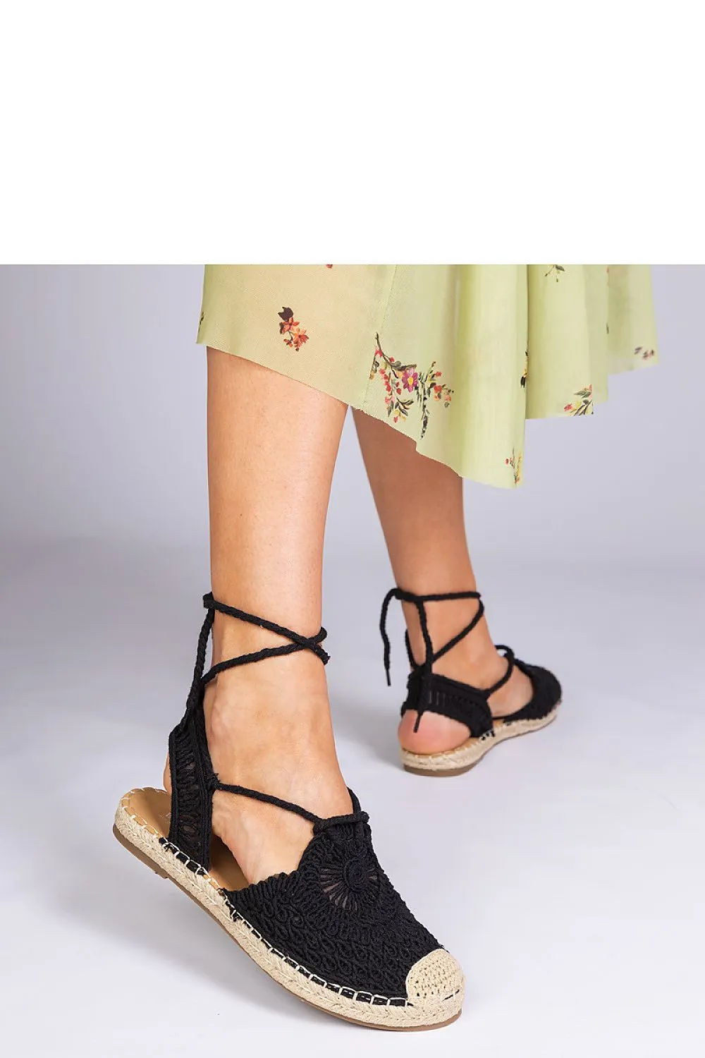 Unique black espadrille sandals with a flat heel