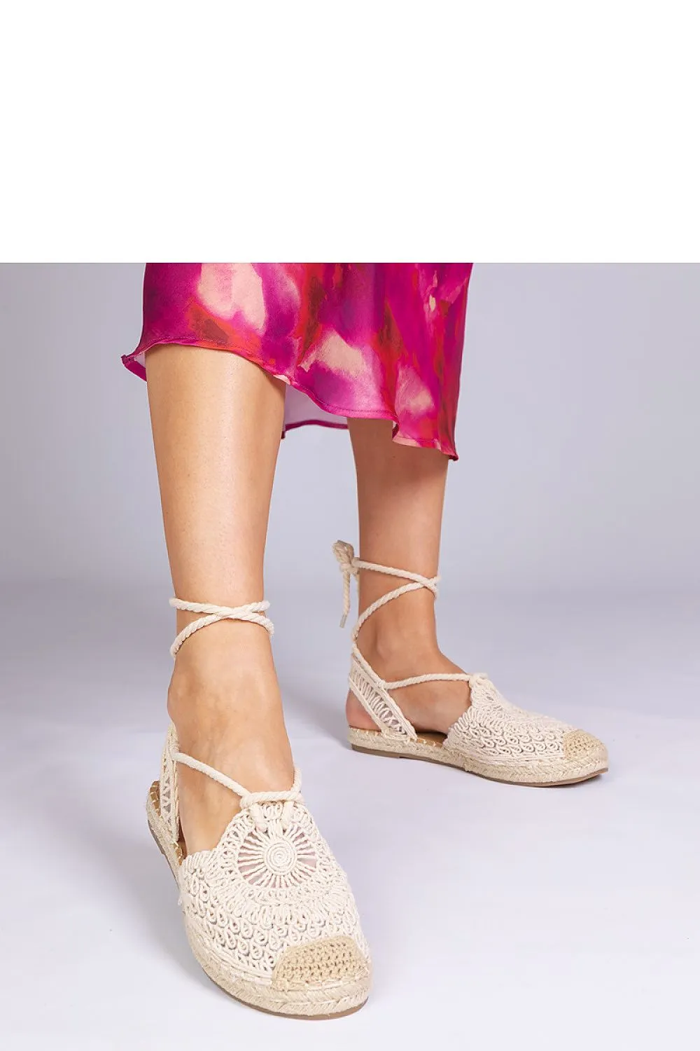 Unique black espadrille sandals with a flat heel