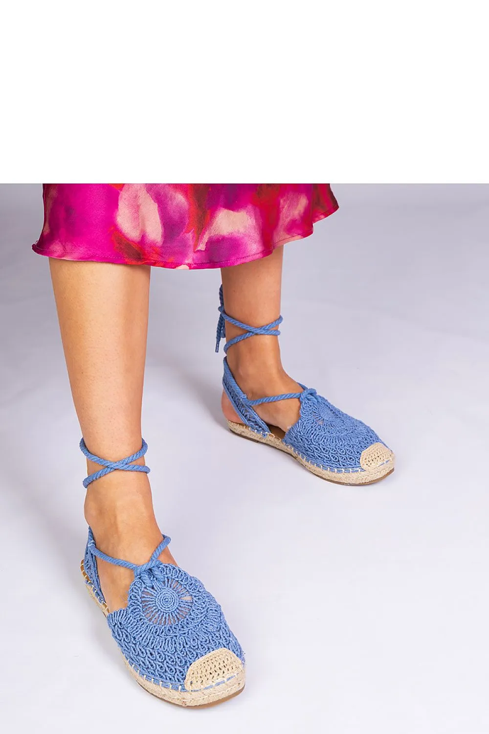 Unique black espadrille sandals with a flat heel