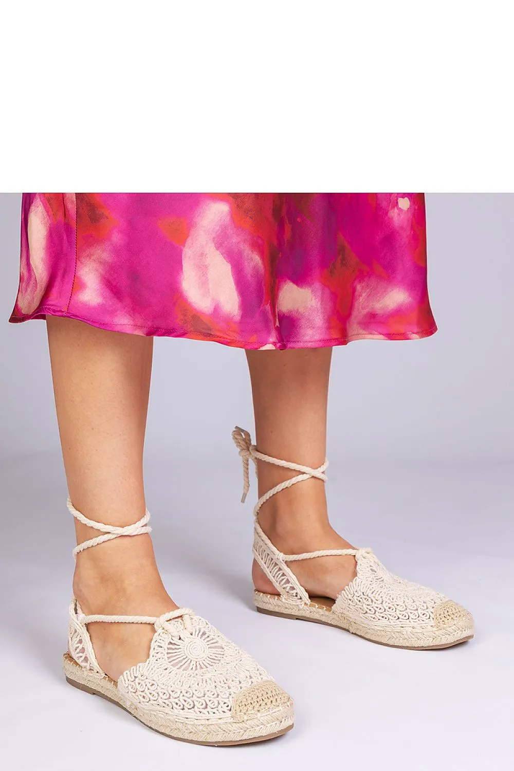 Unique black espadrille sandals with a flat heel