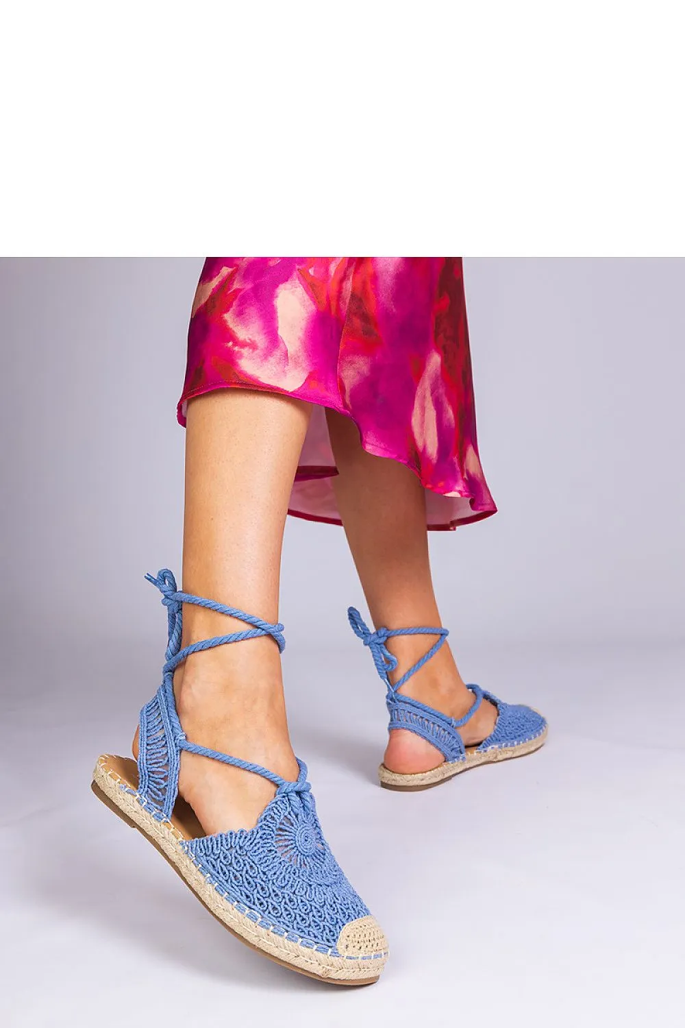 Unique black espadrille sandals with a flat heel