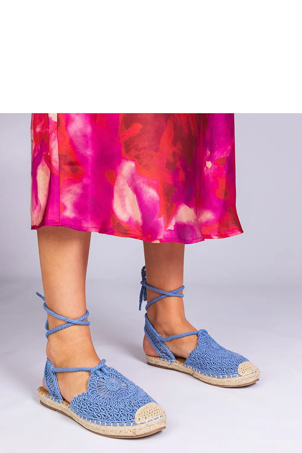 Unique black espadrille sandals with a flat heel