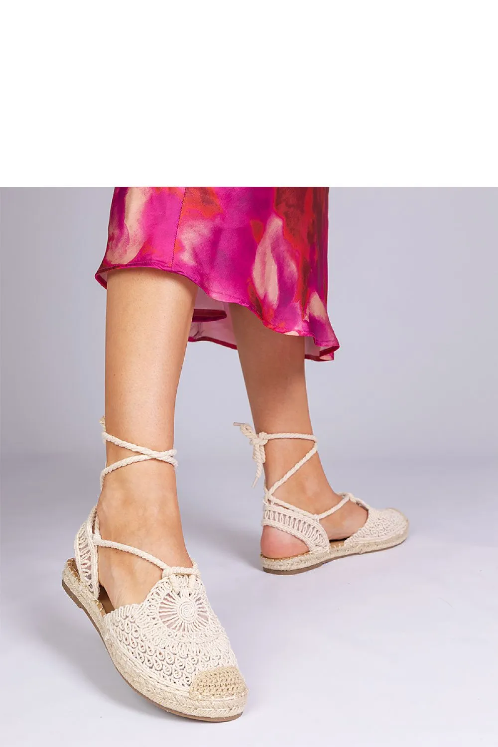 Unique black espadrille sandals with a flat heel