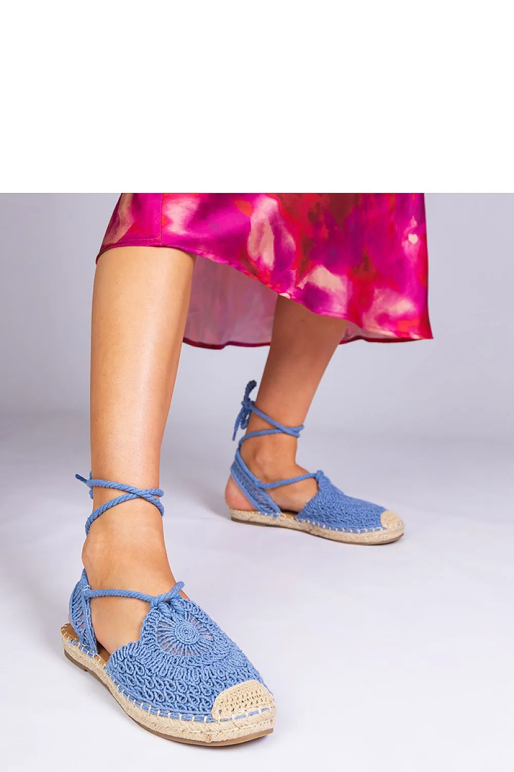 Unique black espadrille sandals with a flat heel