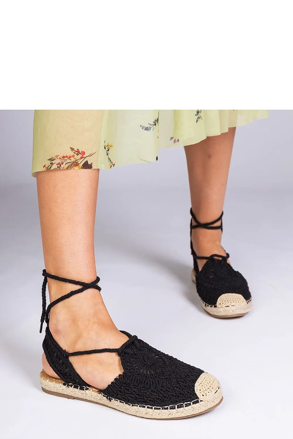 Unique black espadrille sandals with a flat heel