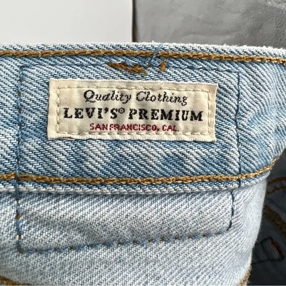 Vintage Levi's Premium Button Placket Cutoff Light Blue Wash Frayed Denim Shorts