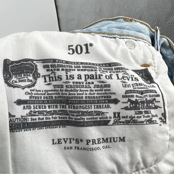 Vintage Levi's Premium Button Placket Cutoff Light Blue Wash Frayed Denim Shorts